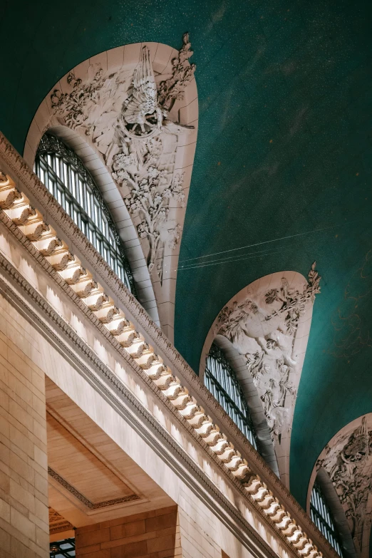 a clock mounted to the side of a building, an album cover, by Alison Geissler, unsplash contest winner, art nouveau, interior of a marble dome, new york buildings, ceiling hides in the dark, high arches