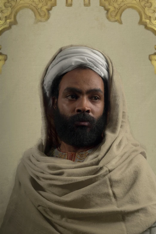 a man with a beard standing in front of a mirror, inspired by Jean-Étienne Liotard, trending on reddit, renaissance, brown skin man egyptian prince, ( ( theatrical ) ), jesus of nazareth, still image from tv series