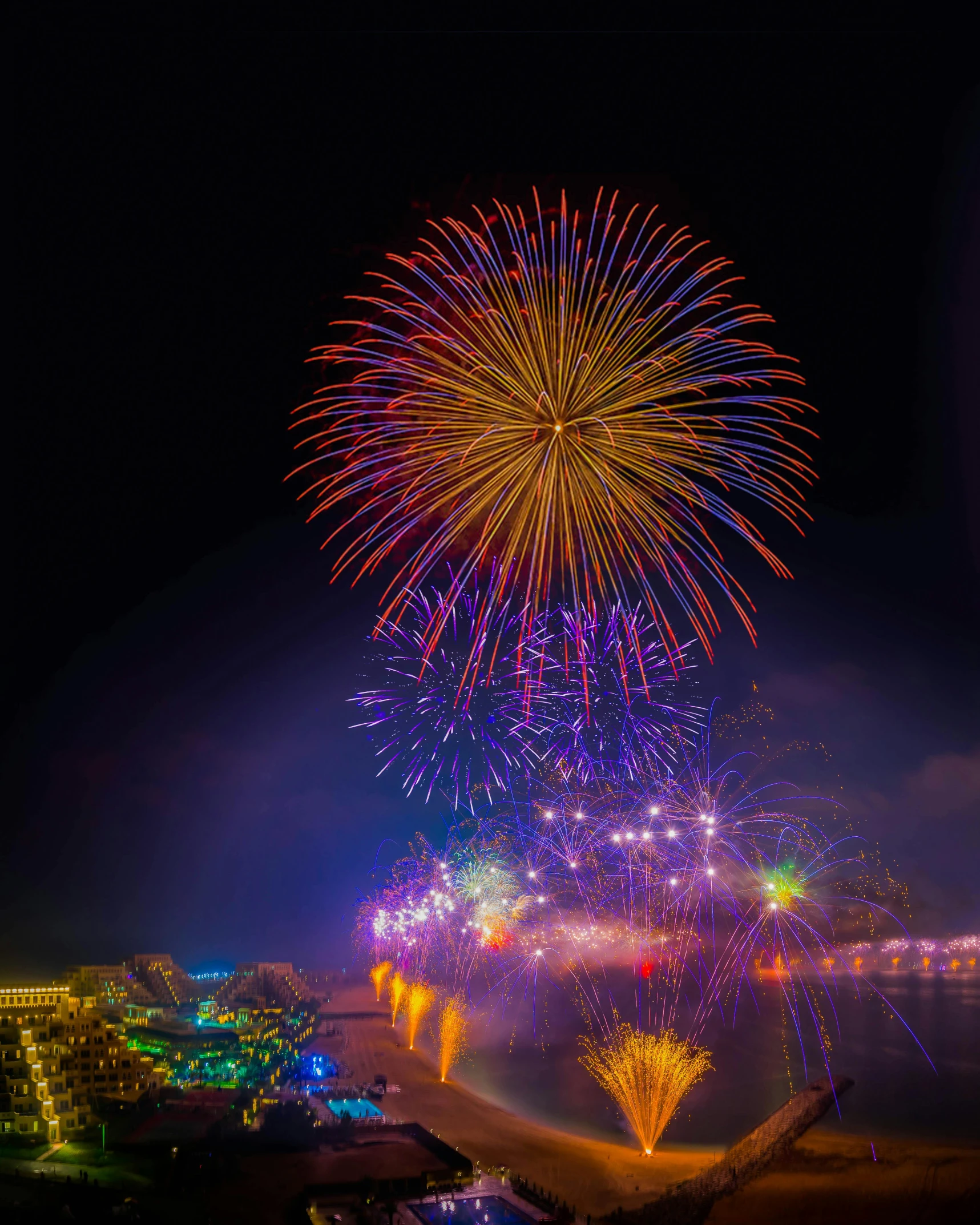 fireworks lights up the night sky over a city, by Drew Tucker, pexels contest winner, renaissance, oceanside, gay pride, thumbnail, south korea