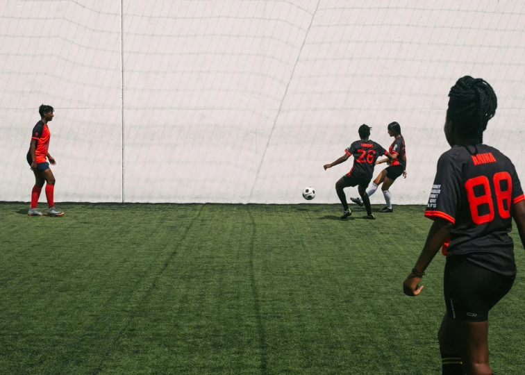 a group of young women playing a game of soccer, unsplash contest winner, figuration libre, wide establishing shot, ignant, pitchblack skin, low quality photo