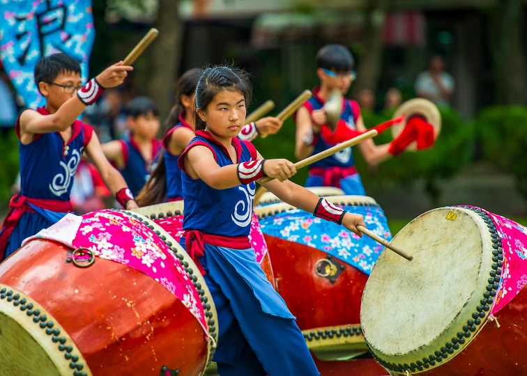 a group of people that are playing drums, inspired by Miao Fu, pexels contest winner, cloisonnism, avatar image, girls, parade floats, focused photo
