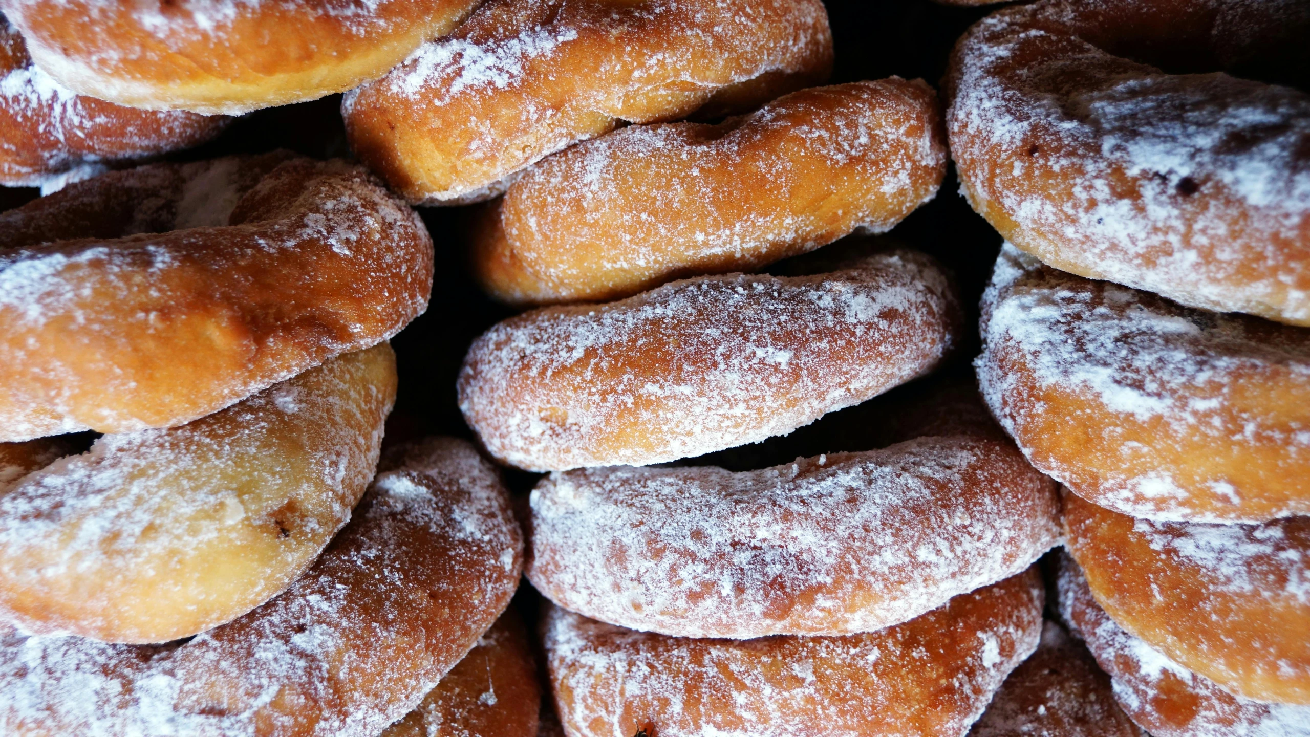 a pile of doughnuts sitting on top of each other, hurufiyya, up-close, southern slav features, profile image, feature