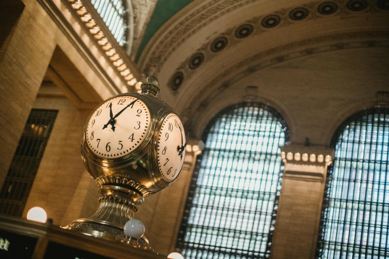 a close up of a clock in a building, in the middle of new york, profile image, fan favorite, grand library