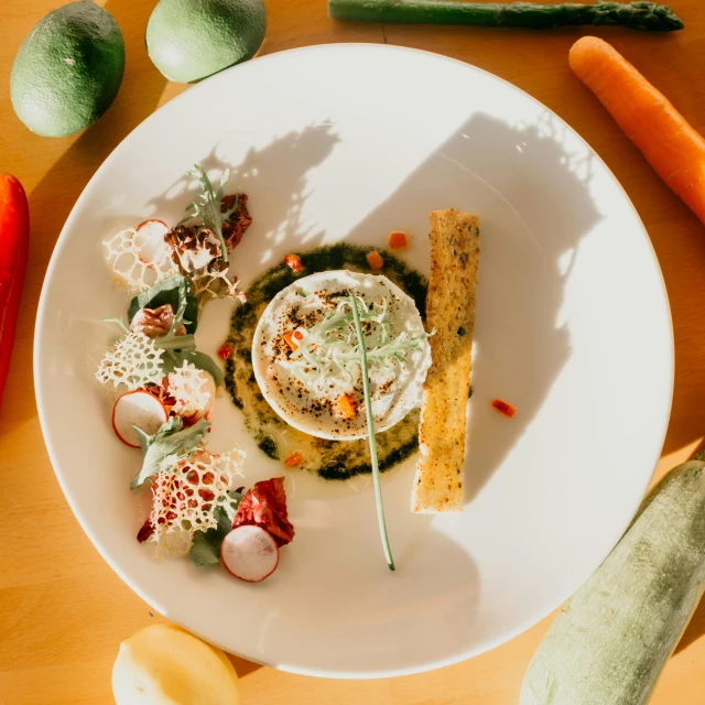 a white plate topped with food on top of a wooden table, a still life, pexels contest winner, veggies, solarpunk cantine, award winning dish, thumbnail