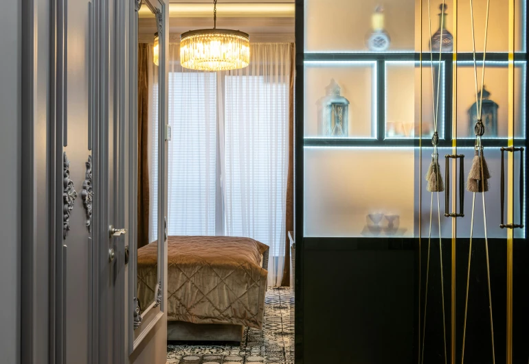 a view of a bedroom through a glass door, inspired by Albert Paris Gütersloh, unsplash, art nouveau, silver gold details, spa, smooth panelling, with crystals on the walls