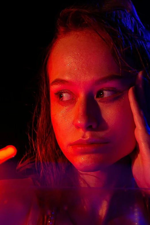 a close up of a person holding a cell phone, a portrait, inspired by Nan Goldin, neo-fauvism, neon operator margot robbie, alicia vikander, perfectly lit. movie still, concerned expression