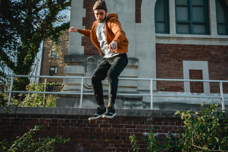 a man flying through the air while riding a skateboard, by Niko Henrichon, pexels contest winner, wearing jeans and a black hoodie, looking off to the side, schools, mid fall