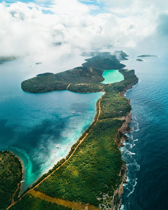 an aerial view of an island in the middle of the ocean, pexels contest winner, sumatraism, thumbnail, brown and cyan color scheme, multiple stories, croatian coastline