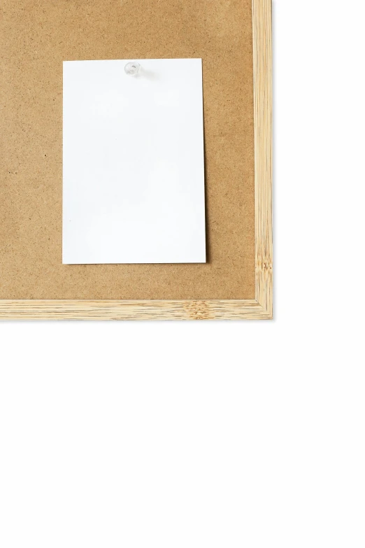 a piece of paper pinned to a bulletin board, a picture, by Matthias Stom, bamboo wood, detailed product image, dwell, card frame