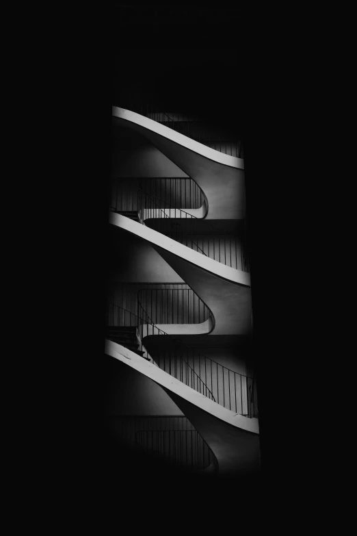 a black and white photo of an escalator, inspired by Arnold Newman, unsplash contest winner, minimalism, jagged spiraling shapes, on a black background, alessio albi, stairs from hell to heaven