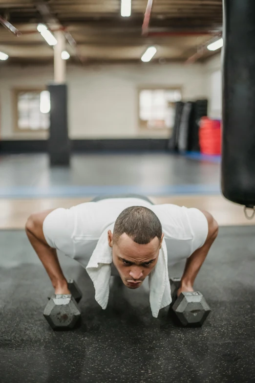 a man doing push ups in a gym, by Austin English, square, praised, centered shot, bao pham