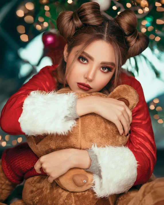 a woman holding a teddy bear in front of a christmas tree, a colorized photo, by Julia Pishtar, trending on pexels, kawaii hairstyle, portrait of vanessa morgan, cgsociety unreal engine, brown hair in two buns