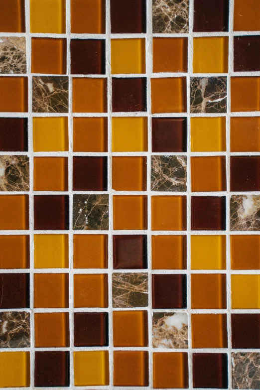 a close up of a mosaic tile wall, amber, 40 mm, inca themed smooth, demur