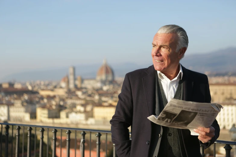 a man standing on a balcony reading a newspaper, a portrait, pexels contest winner, renaissance, pierce brosnan, with a city in the background, florence, promotional image