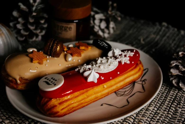 a pastry sitting on top of a white plate, a still life, by Julia Pishtar, pexels contest winner, hot dog, hight decorated, in paris, 🦩🪐🐞👩🏻🦳