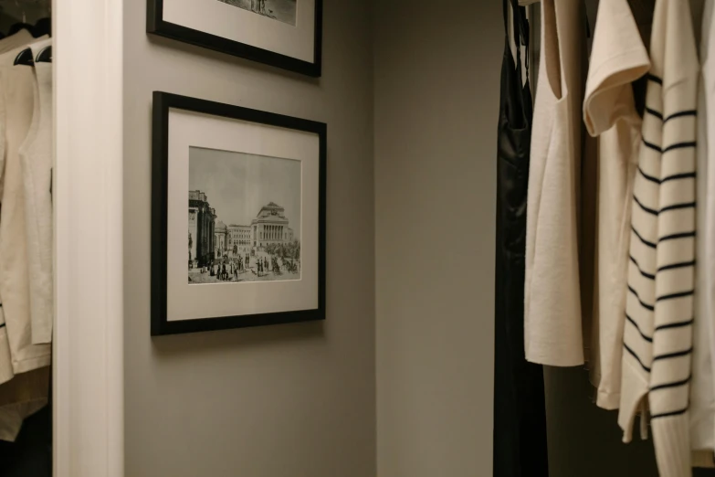 a white toilet sitting next to a bathroom sink, a black and white photo, inspired by René Burri, unsplash, square pictureframes, elegant wardrobe, an archway, close up shot from the side