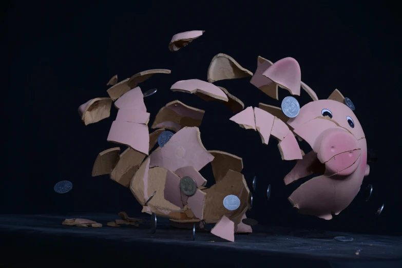 a pig made out of cardboard sitting on top of a table, by Ivan Generalić, pexels contest winner, conceptual art, money falling from the sky, in front of a black background, broken toys are scattered around, clay animation
