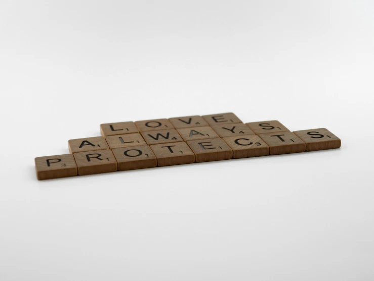 scrabble tiles spelling love always protects, an album cover, inspired by Ian Hamilton Finlay, conceptual art, marvelous designer substance, kris kuksi, product introduction photo, animation