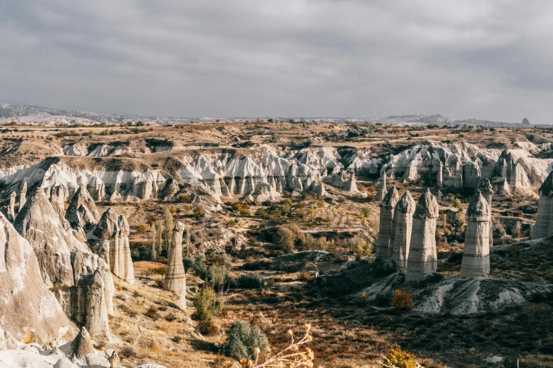 the landscape of cappadin in cappadin national park, cappadin national park, cappadin national park, cappadin, pexels contest winner, art nouveau, grey, asymmetrical spires, 2 0 2 2 photo, canyon topography