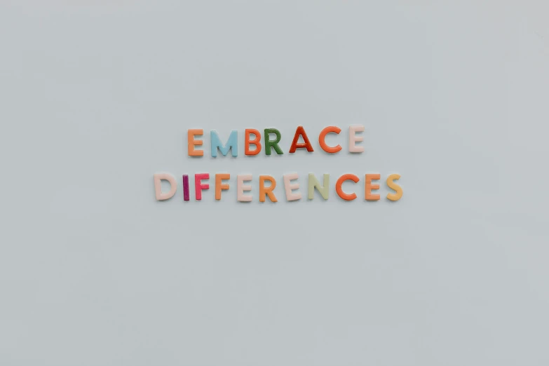 the words embrace differences written in multicolored letters, a picture, unsplash, wall art, 9, maths, emoji