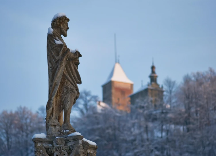 a statue with a clock tower in the background, inspired by Karl Stauffer-Bern, pexels contest winner, renaissance, outside winter landscape, zdzislaw, slide show, portrait image