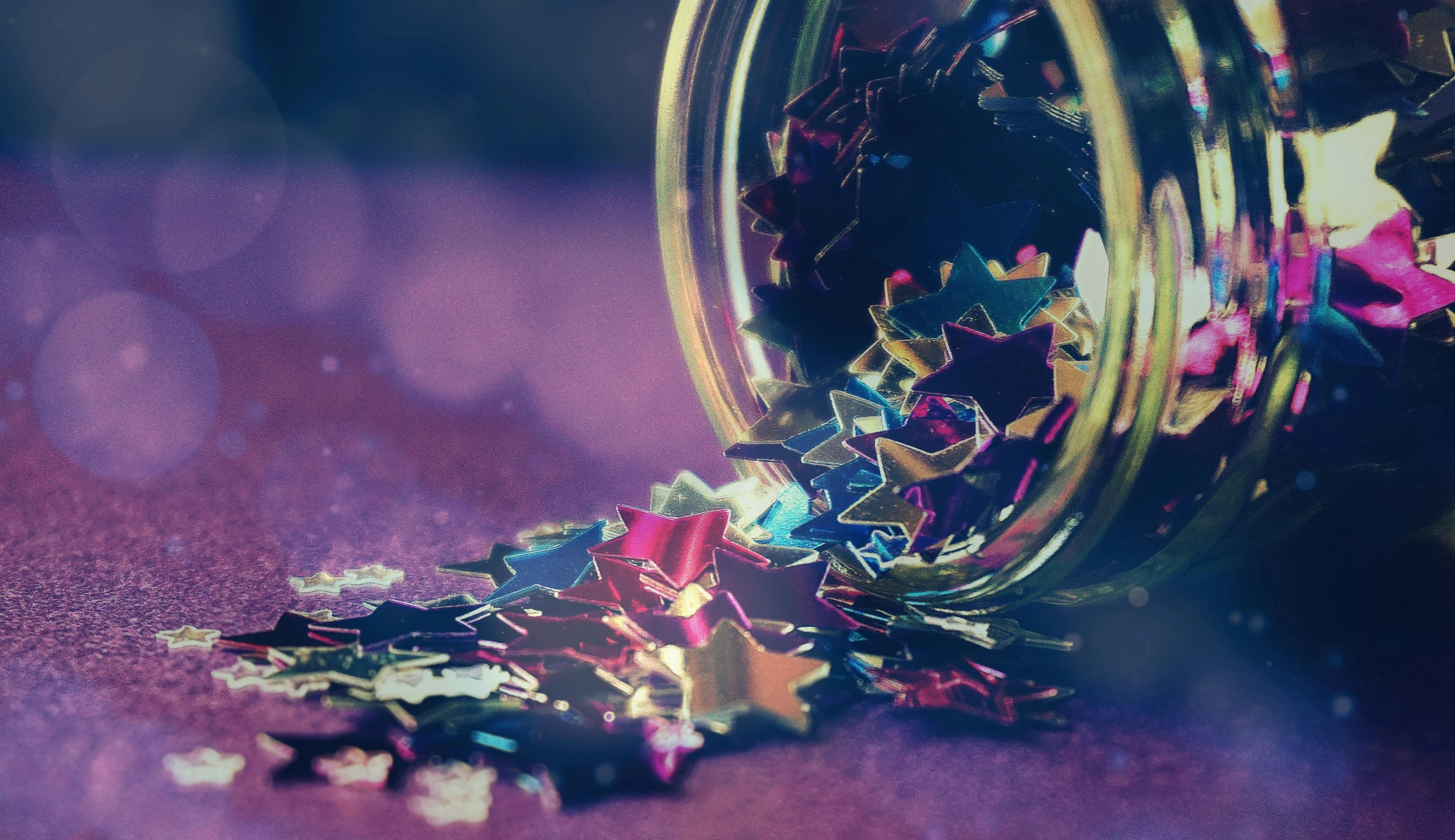 a close up of a jar of confetti, by Julia Pishtar, trending on pexels, process art, shinning stars, retro effect, magic star, broken composition