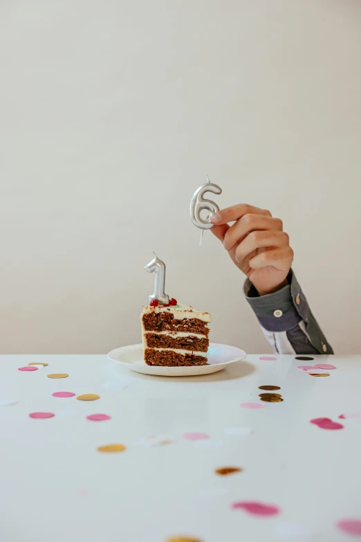 a person cutting a piece of cake with a knife, by Julia Pishtar, trending on unsplash, birthday, sits on a finger, r-number, :6