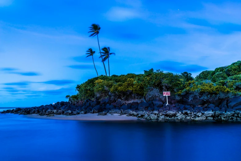 a small island in the middle of a body of water, blue hour photography, hawaii beach, slide show, test