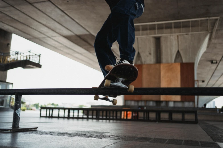 a man riding a skateboard down the side of a rail, pexels contest winner, standing on a desk, 15081959 21121991 01012000 4k, instagram post, at a skate park