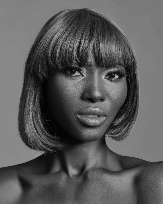 a black and white photo of a woman with short hair, a black and white photo, trending on cg society, afrofuturism, big brown fringe, brown skin. light makeup, lily frank, smooth contours