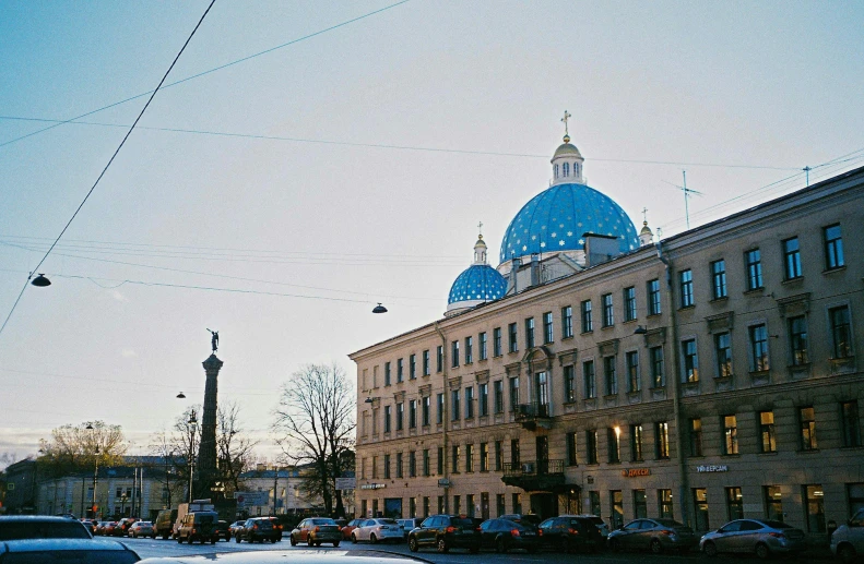 a large building with a blue dome on top of it, a photo, inspired by Illarion Pryanishnikov, neoclassicism, 1990s photograph, saint petersburg, february), conde nast traveler photo