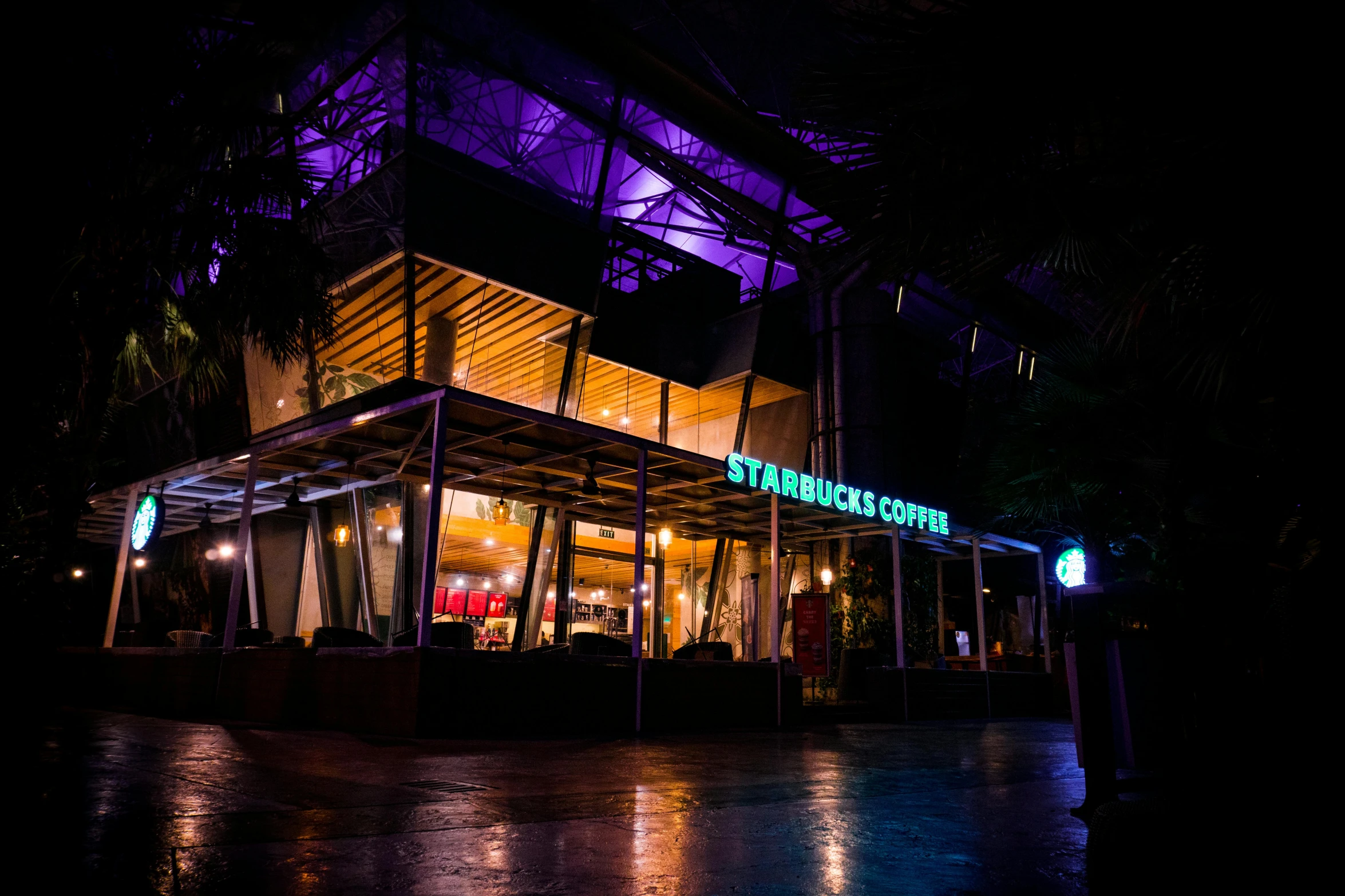 a starbucks coffee shop lit up at night, a portrait, by Alejandro Obregón, unsplash, south jakarta, 💋 💄 👠 👗, woodlands, lit. 'the cube'