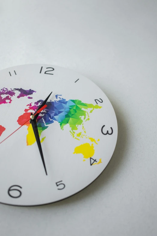 a clock with a world map painted on it, lgbtq, profile photo, product introduction photo, thumbnail