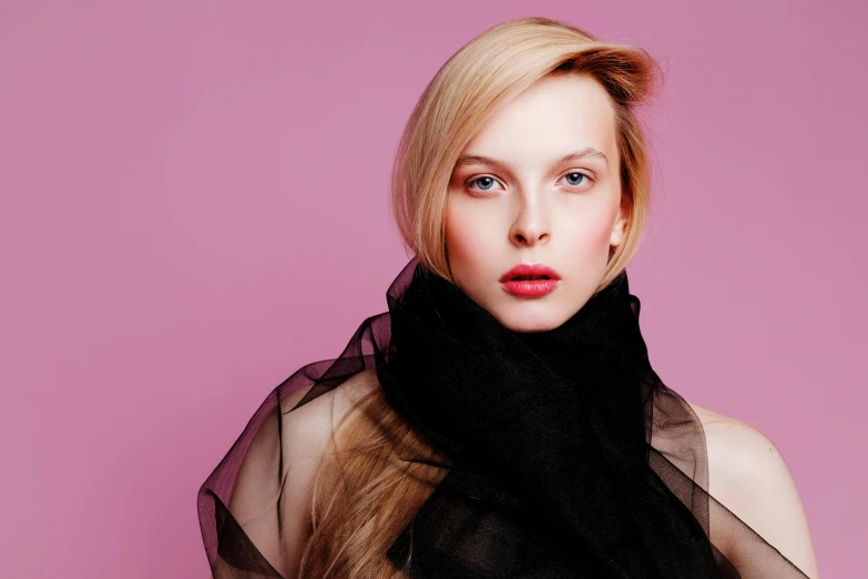 a woman with long blonde hair wearing a black scarf, trending on pexels, pink skin, pointè pose, vouge style photo, pale skin!