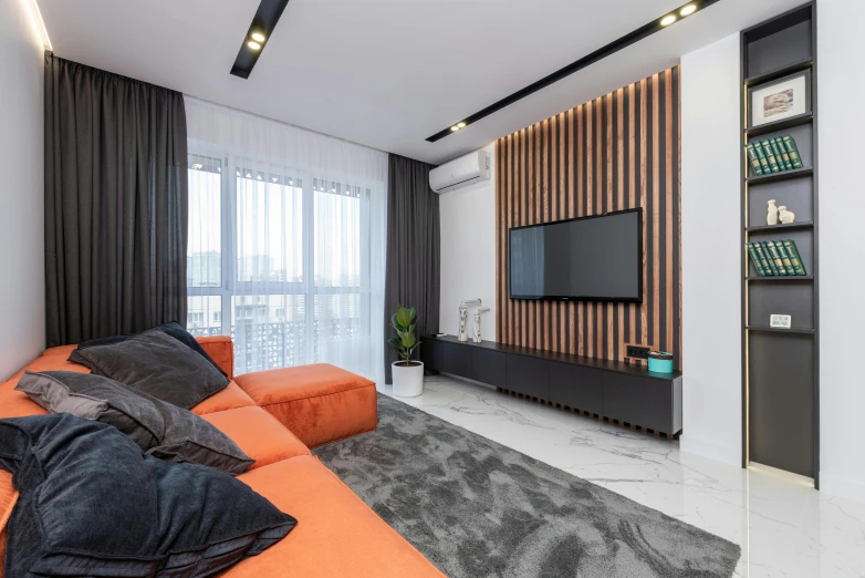 a living room filled with furniture and a flat screen tv, inspired by Michael Gustavius Payne, pexels contest winner, orange and black, concrete hitech interior, 8 k hi - res, small room