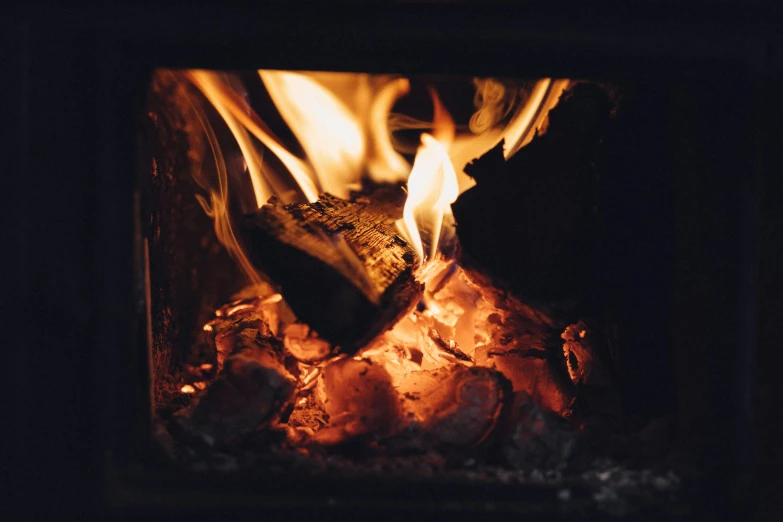 a close up of a fire in a fireplace, pexels contest winner, fan favorite, smokey burnt love letters, instagram post, barrel fires and tents