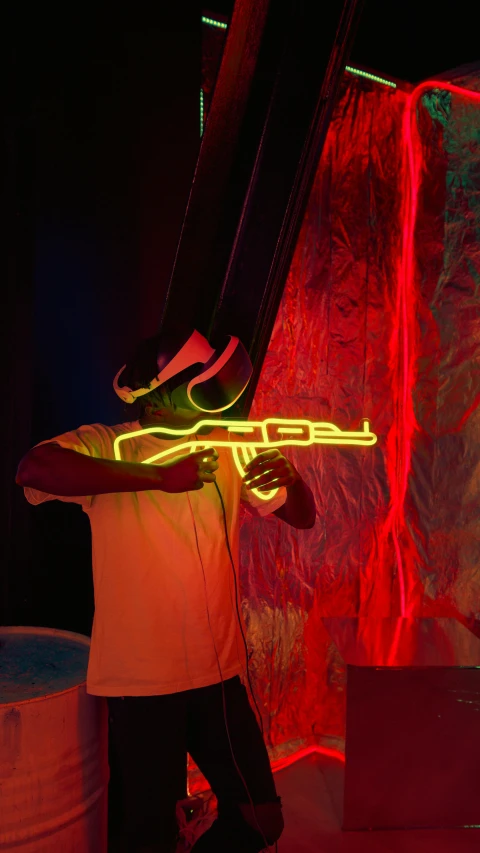 a man standing in front of a neon sign, inspired by Bruce Nauman, pexels, graffiti, holding a ray gun, loop lighting, profile image, instagram picture