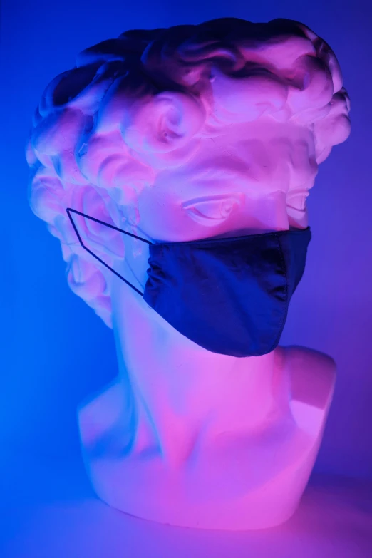 a mannequin head with a mask on it, inspired by Yves Klein, unsplash contest winner, aestheticism, ( ( ( synthwave ) ) ), blue undergarments, face mask, in style of robert mapplethorpe