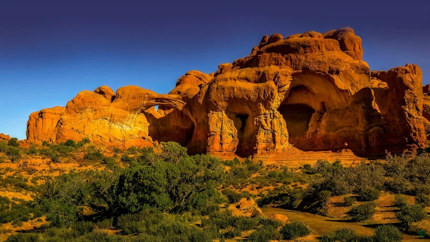 a large rock formation in the middle of a desert, by Arnie Swekel, unsplash contest winner, art nouveau, white stone arches, summer evening, panorama, usa-sep 20