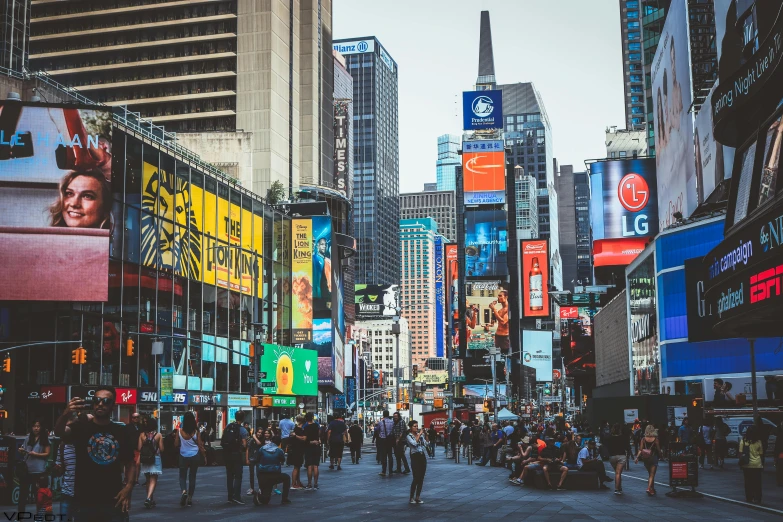 a busy city street filled with lots of people, pexels contest winner, new york backdrop, square, billboard image, tourism