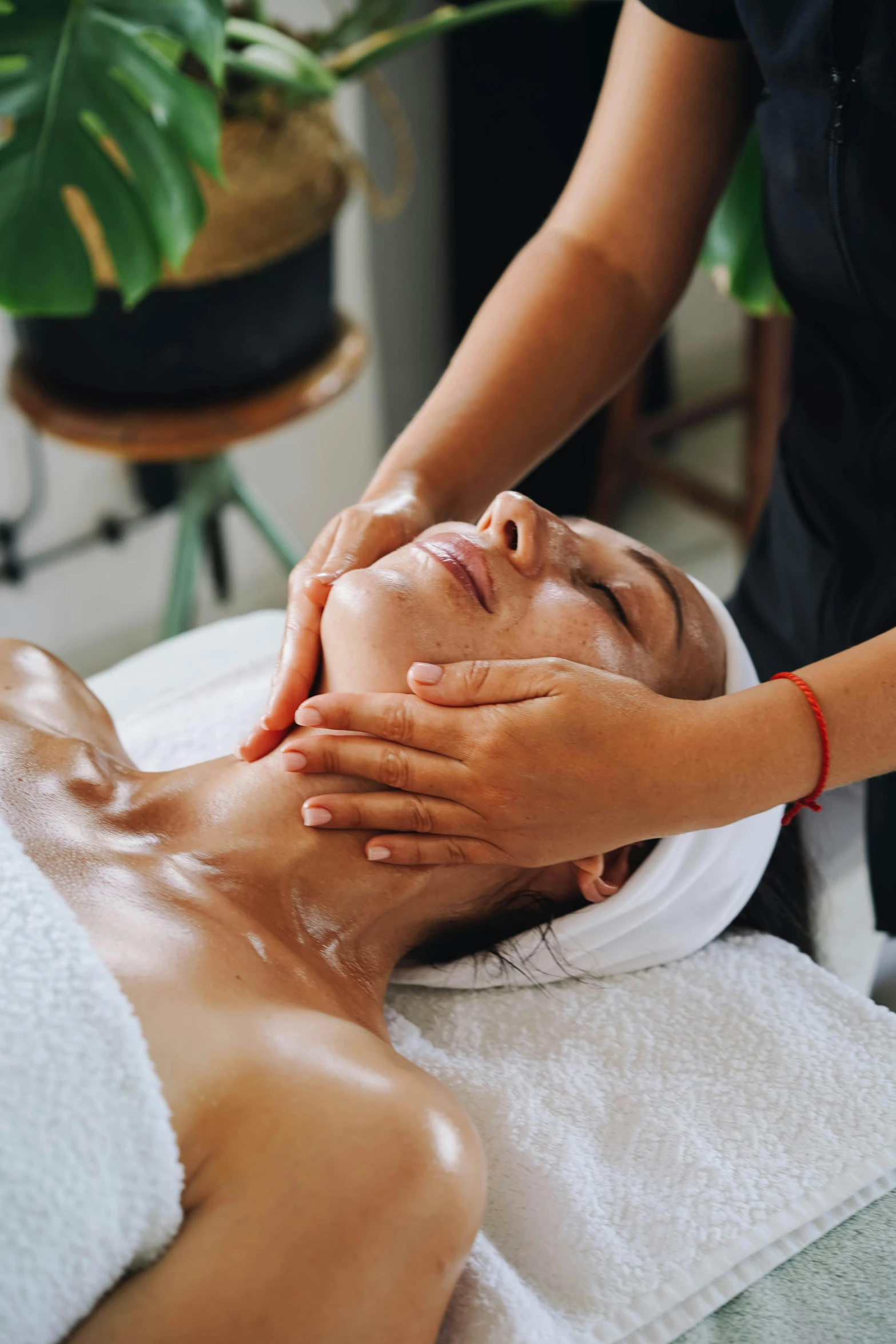 a woman getting a facial massage at a spa, by Julia Pishtar, julia sarda, hoang lap, sculpted