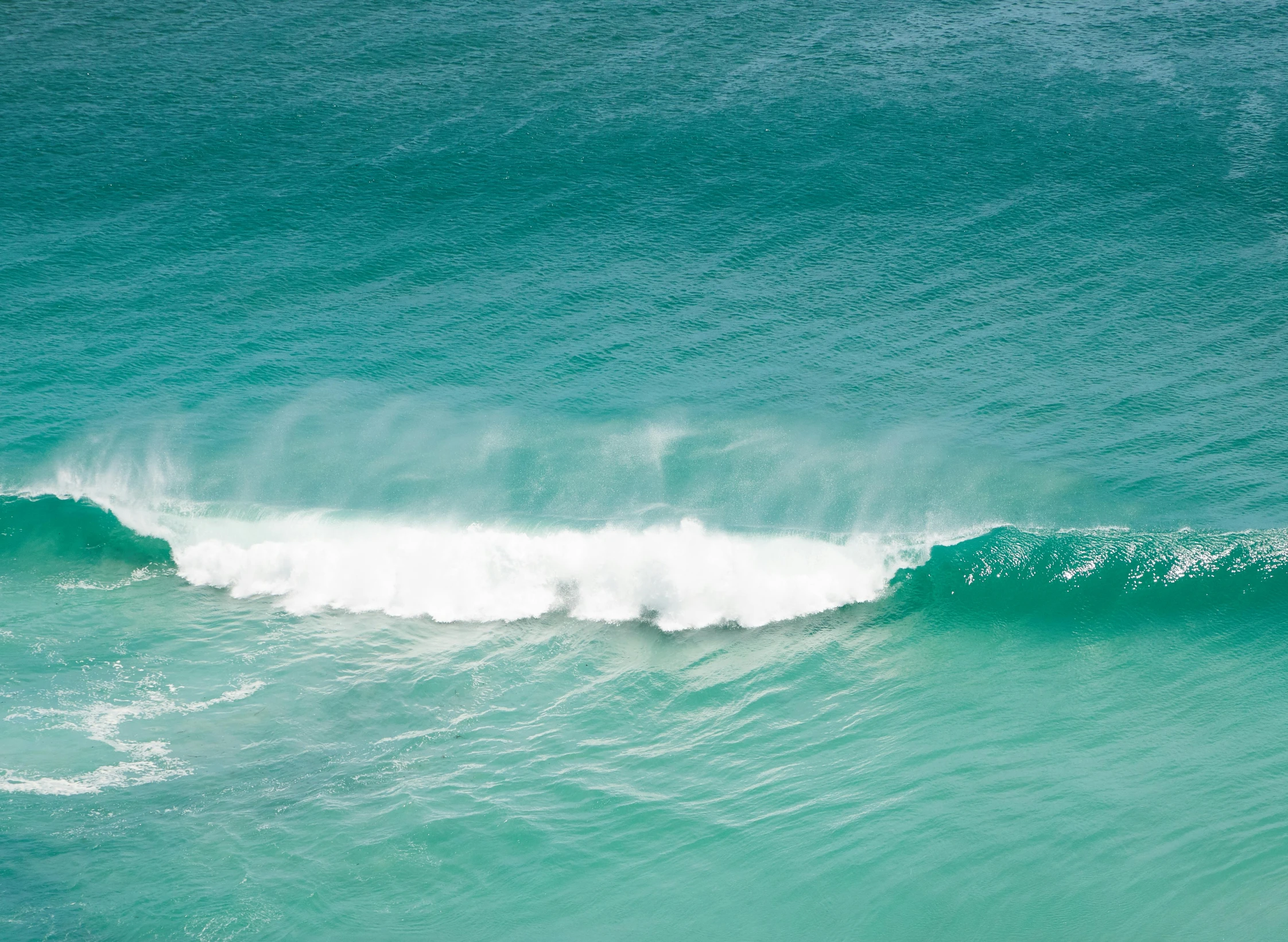 a person riding a surfboard on a wave in the ocean, pexels contest winner, minimalism, turqouise, australian beach, helicopter view, cornwall