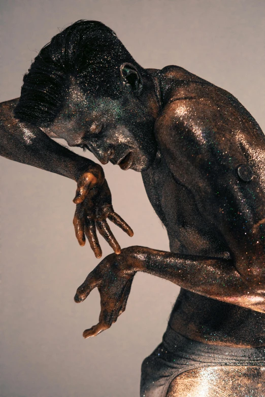 a bronze statue of a man holding a tennis racquet, inspired by David Bailly, featured on zbrush central, figurative art, rotting black clay skin, portrait of combat dancer, closeup of arms, samson pollen