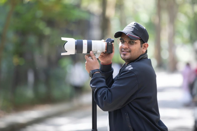 a man taking a picture with a camera, a picture, inspired by Bikash Bhattacharjee, pexels contest winner, photorealism, headshot profile picture, telephoto long distance shot, full body in shot, avatar image