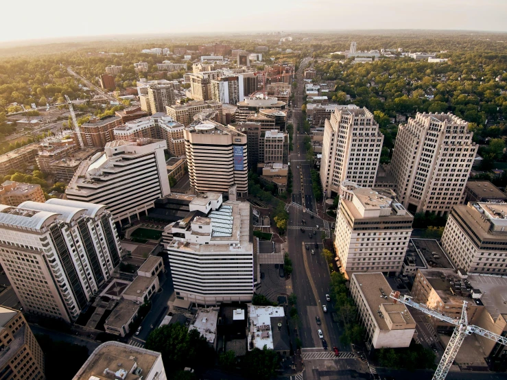 an aerial view of a city with tall buildings, unsplash, realism, jamaica, winnipeg skyline, 2 0 0 0's photo