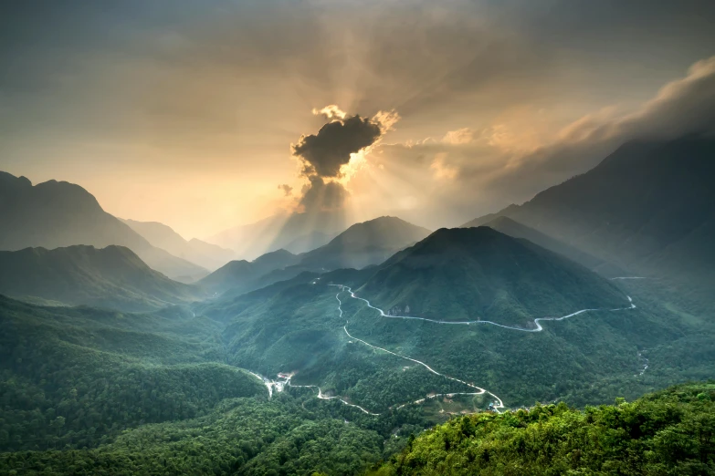 the sun shines through the clouds over the mountains, a matte painting, by Reuben Tam, pexels contest winner, vietnam, alessio albi, multiple stories, conde nast traveler photo