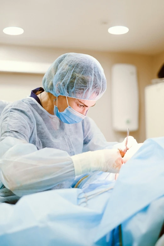 a surgeon working on a patient in an operating room, a picture, by Rachel Reckitt, shutterstock, plating, thick linings, thumbnail, instagram post