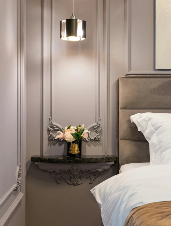 a bed room with a neatly made bed, inspired by Pierre-Joseph Redouté, baroque, silver details, rgb wall light, carved black marble, flowers