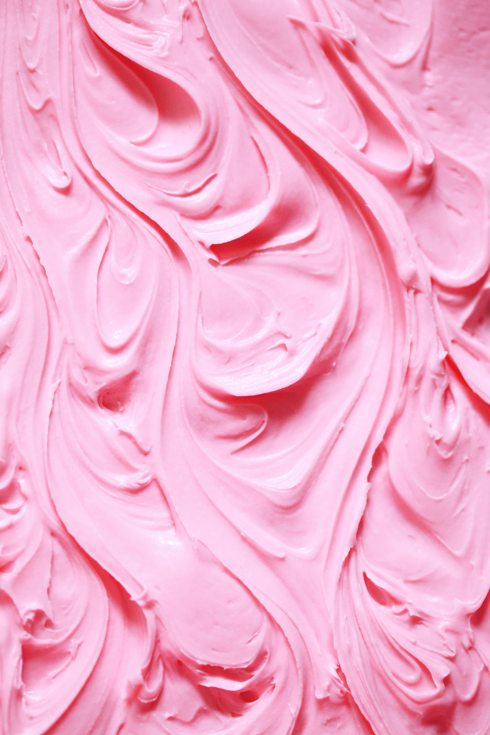 a close up of pink frosting on a cake, inspired by Peter Alexander Hay, trending on pexels, art nouveau, silicone skin, wavy, 🍸🍋