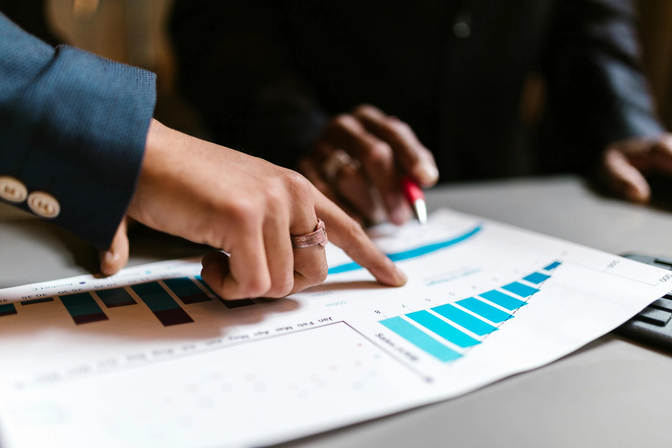 a close up of a person pointing at a piece of paper, trending on pexels, analytical art, bar charts, avatar image, 1 2 9 7, formulas